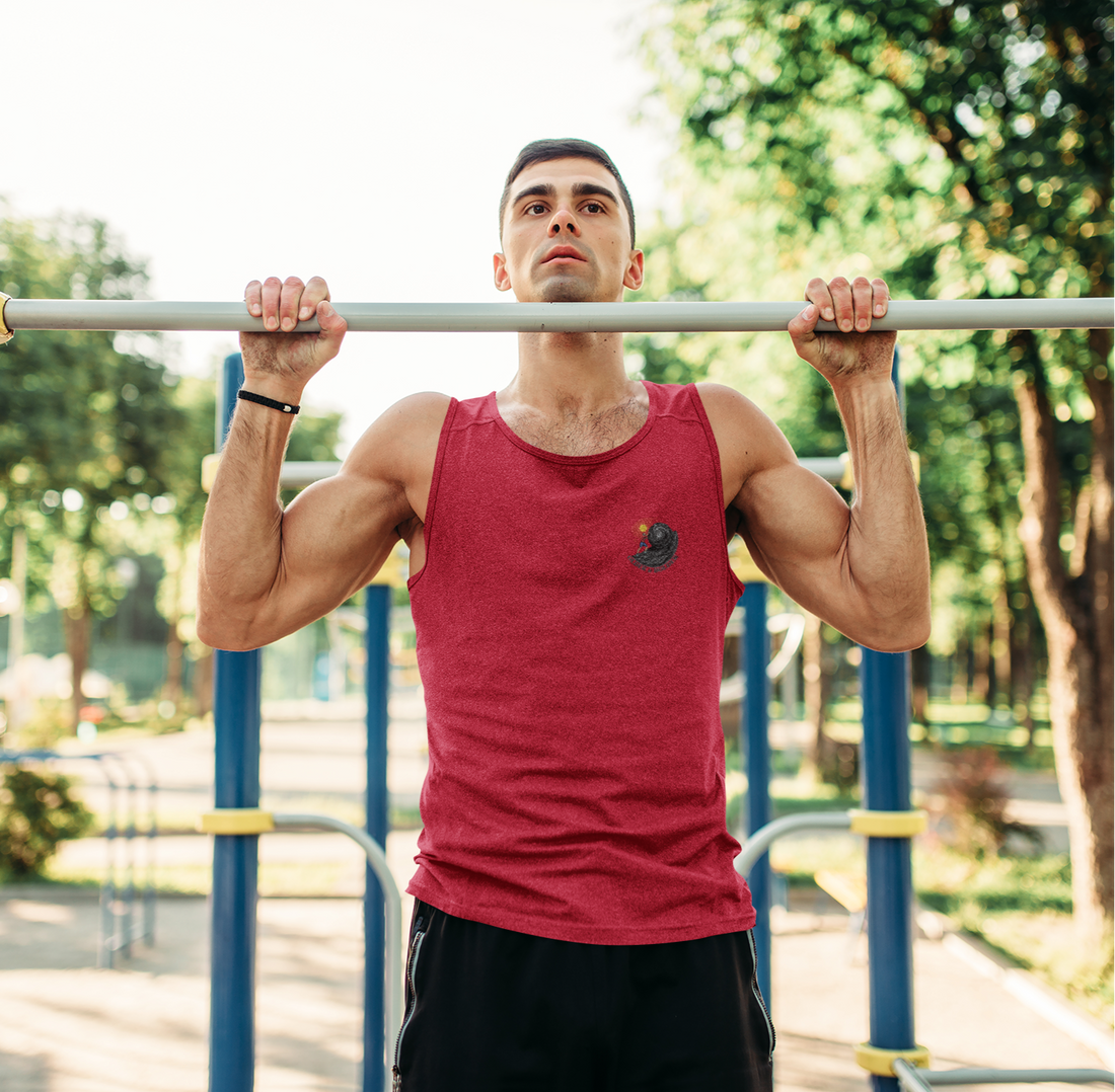 Man doing a pull up in a red performance tank top